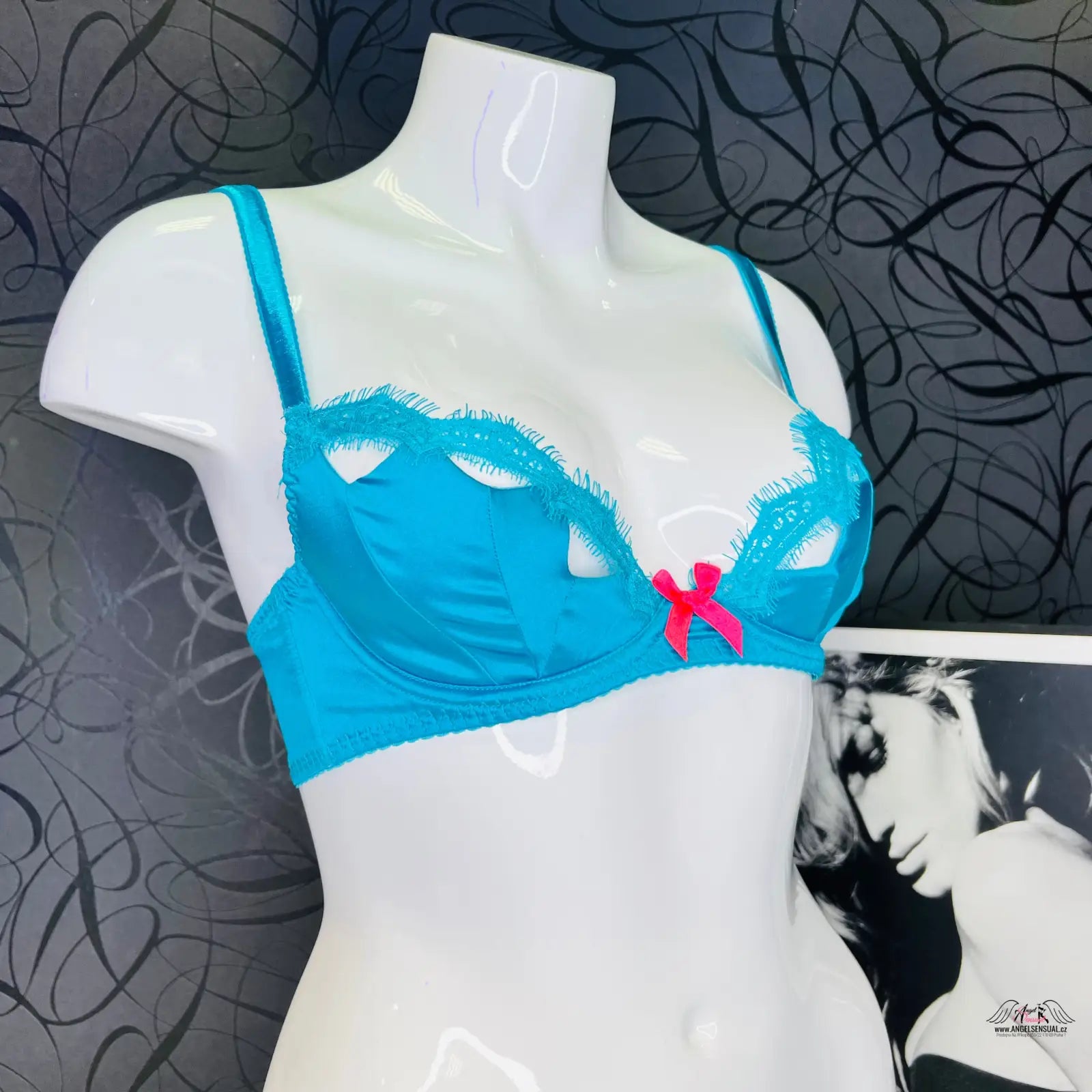 Turquoise podprsenka Lavelle s krajkovým lemem a růžovou mašlí, sytě barevná podprsenka