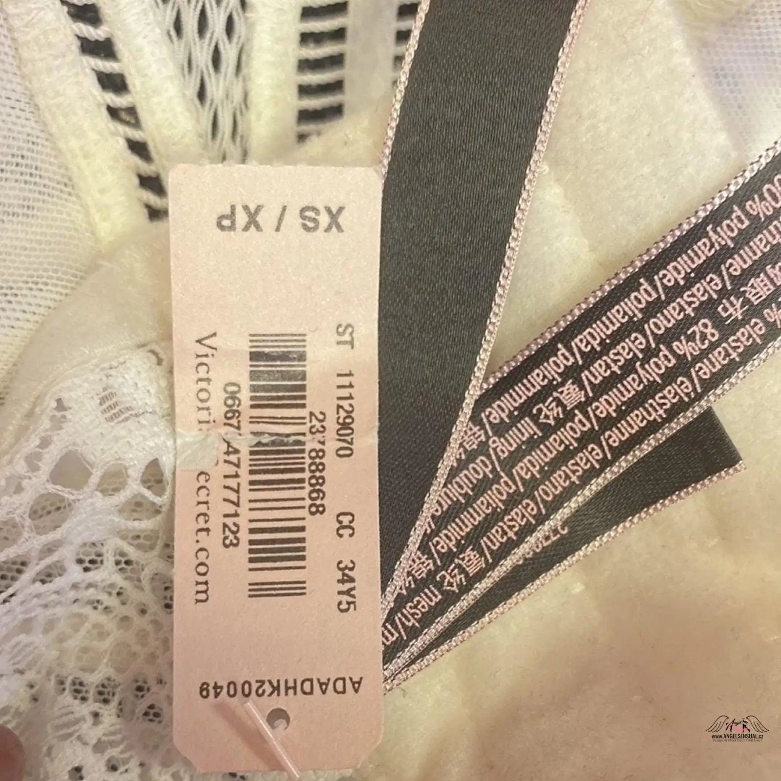 Label on a white dress from Luxusní Elegance: Krajková Braletka od Braletka