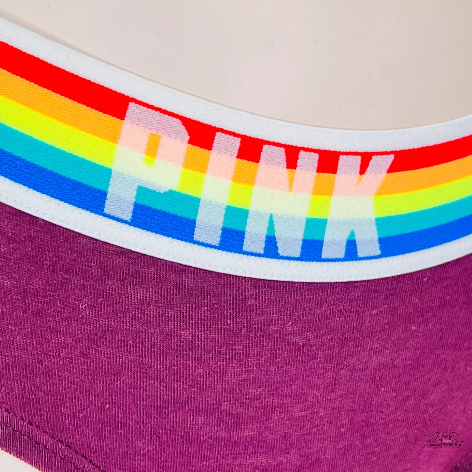 Gumou hipster PINK logo on white band, lingerie apparel & accessories, purple background