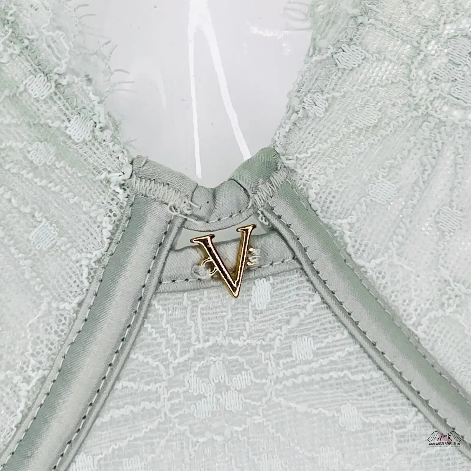 Gold V-shaped kovová ozdoba na světle mátové krajce korzet Victoria’s Secret