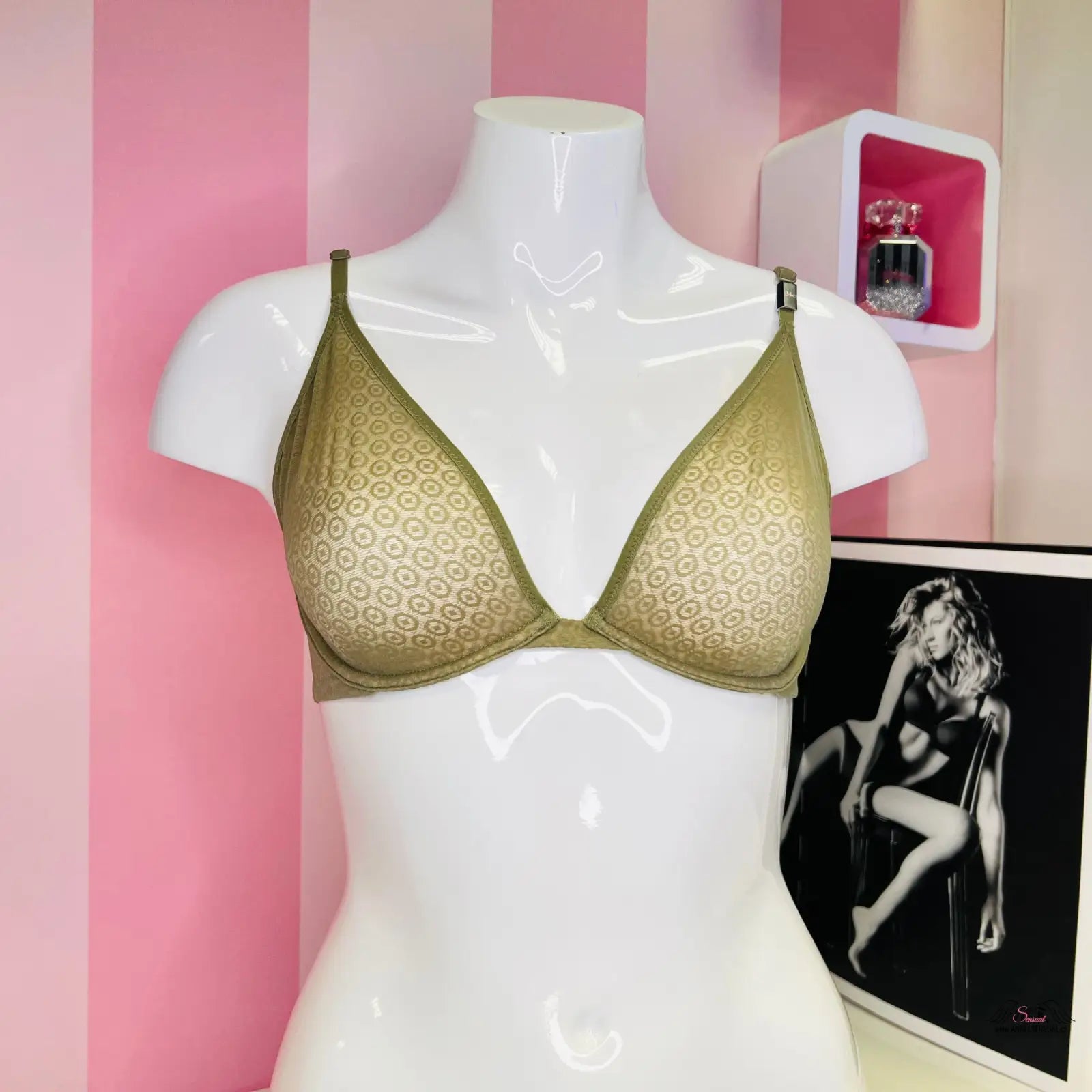 Olive green lace bra on white mannequin torso, šalvějová unlined plunge style