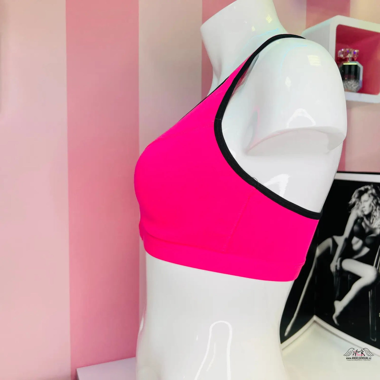 Sportovní podprsenka Victoria’s Secret s růžovým designem a nastavitelnými ramínky