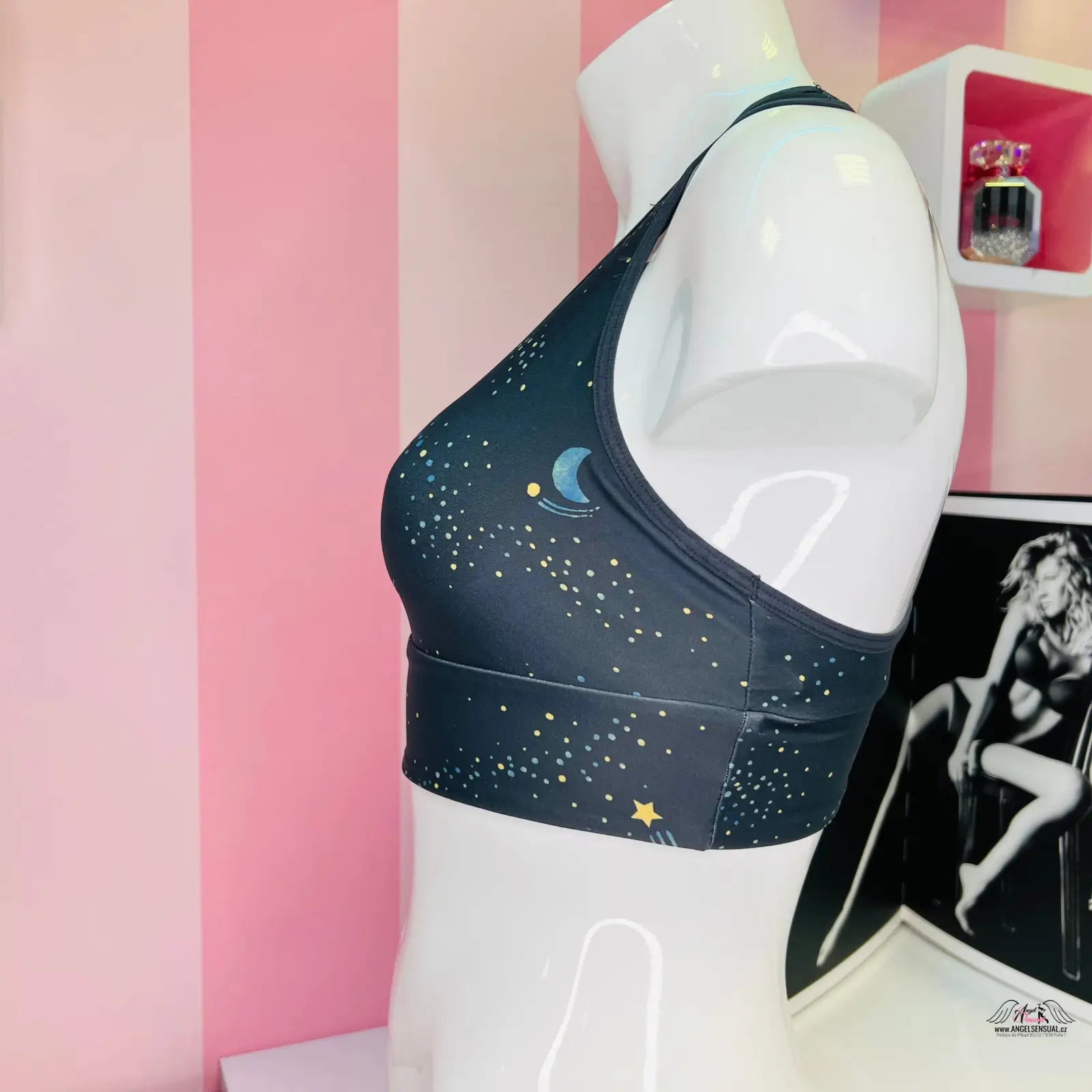 Dark blue sportovní podprsenka s vesmírným motivem hvězd a Měsíc od Victoria’s Secret