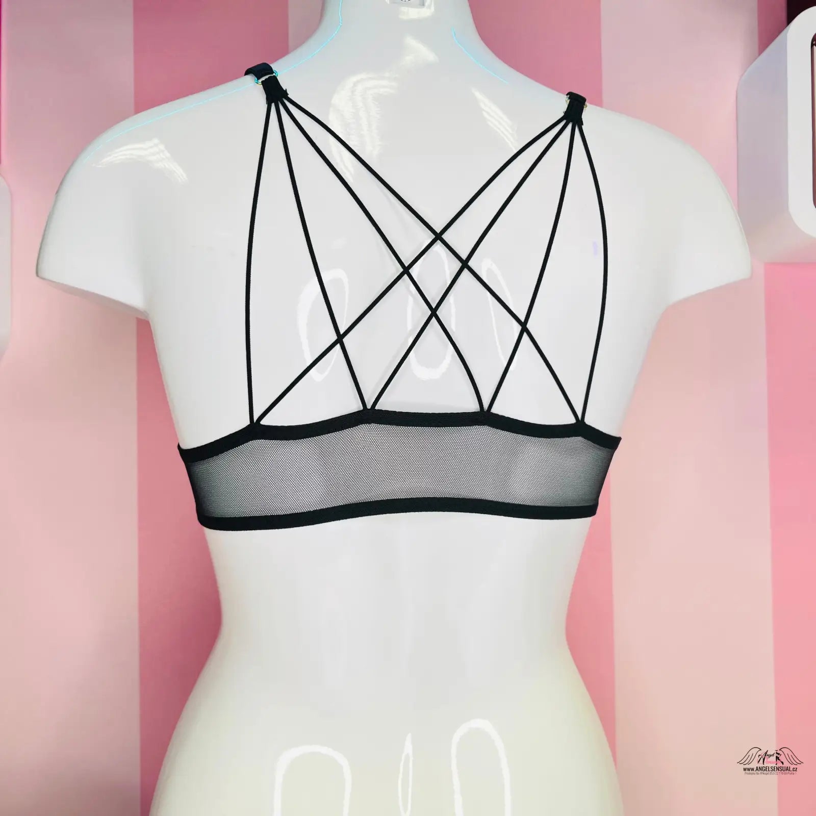 Bílý manekýn s černou podprsenkou Victoria’s Secret Podprsenka Secret Unlined