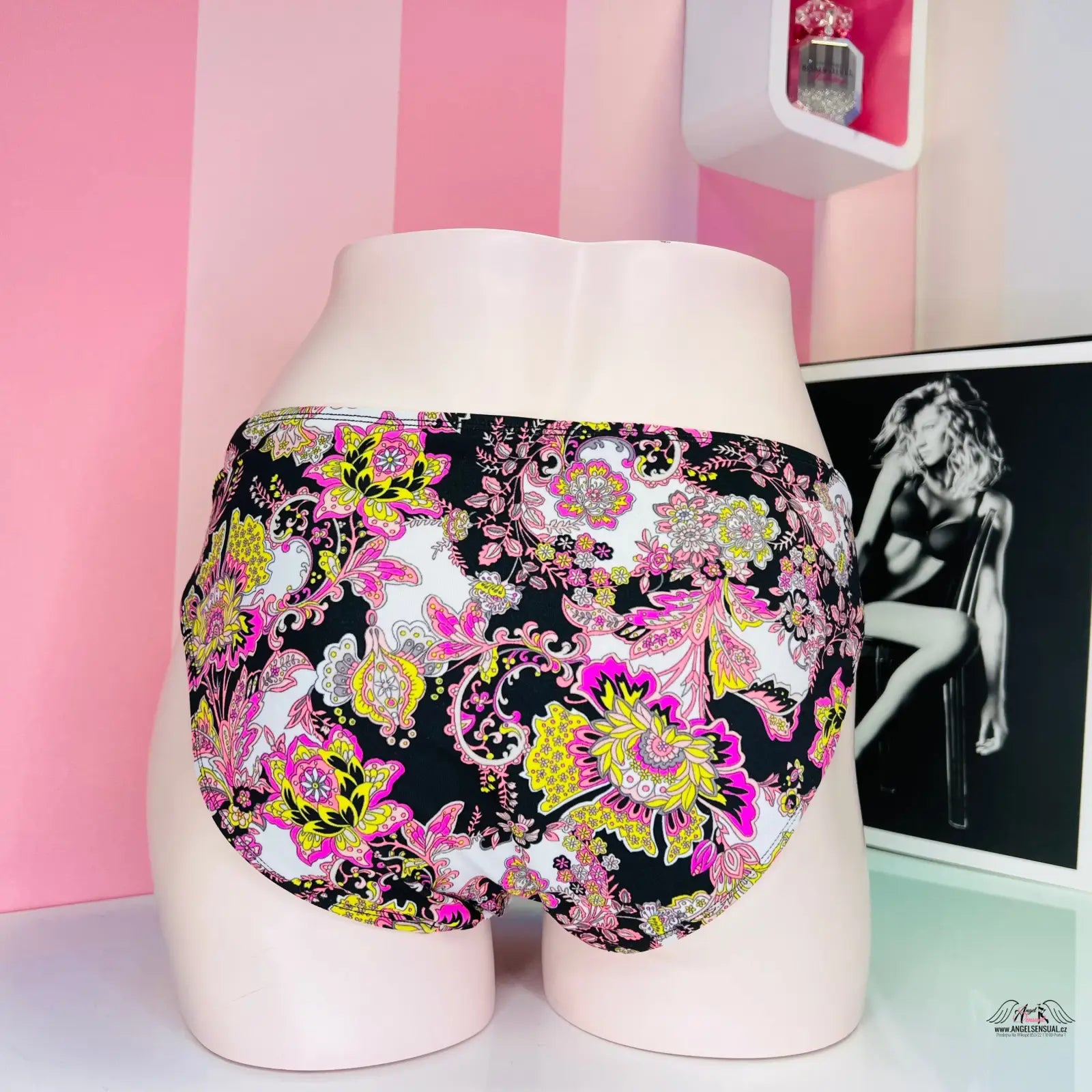 Floral patterned underwear with black background and pink, yellow, purple flowers, barevný spodní díl plavek