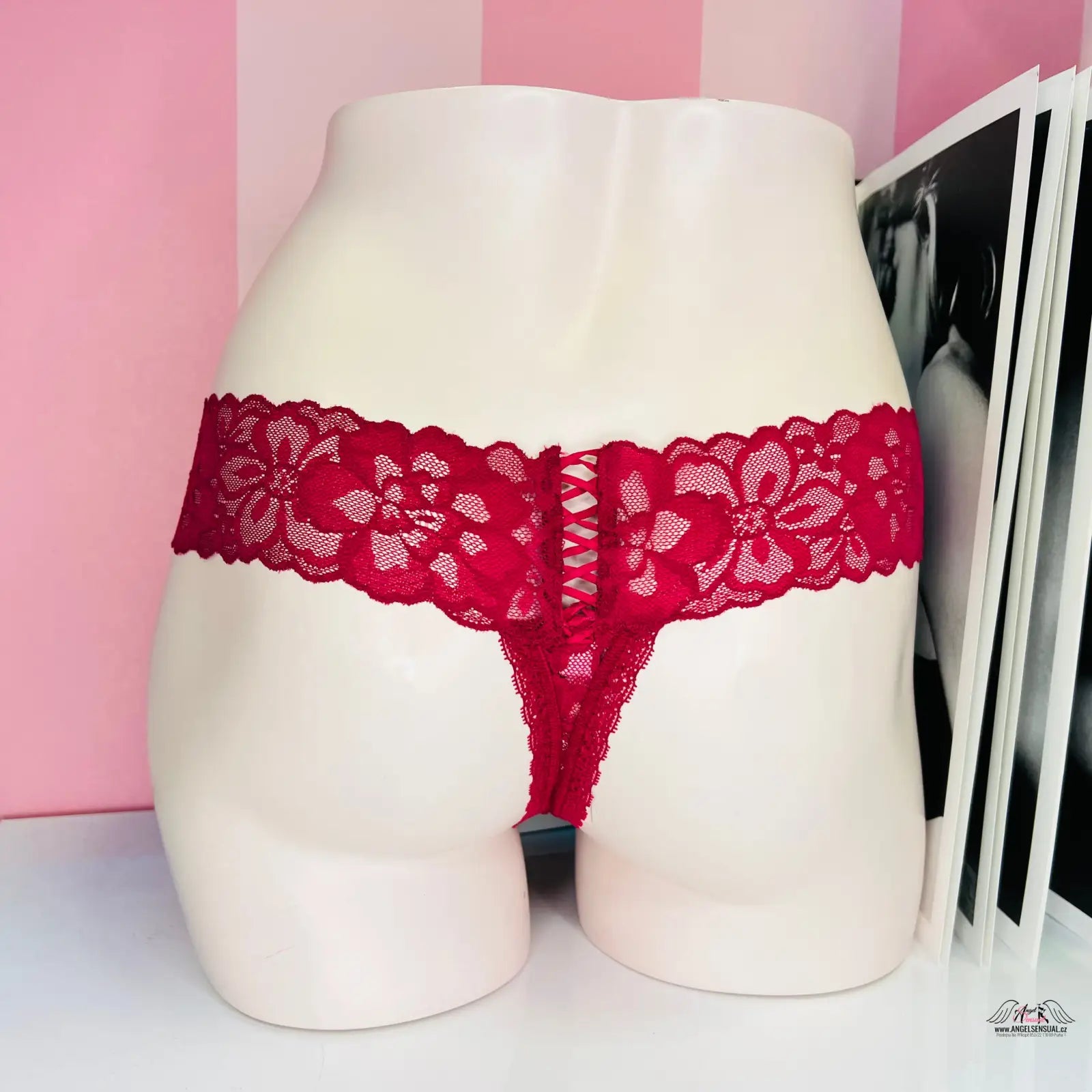 Red lace thong with ozdobným šněrováním on mannequin, featured in Victoria’s Secret Tanga Krajkové Více Barev