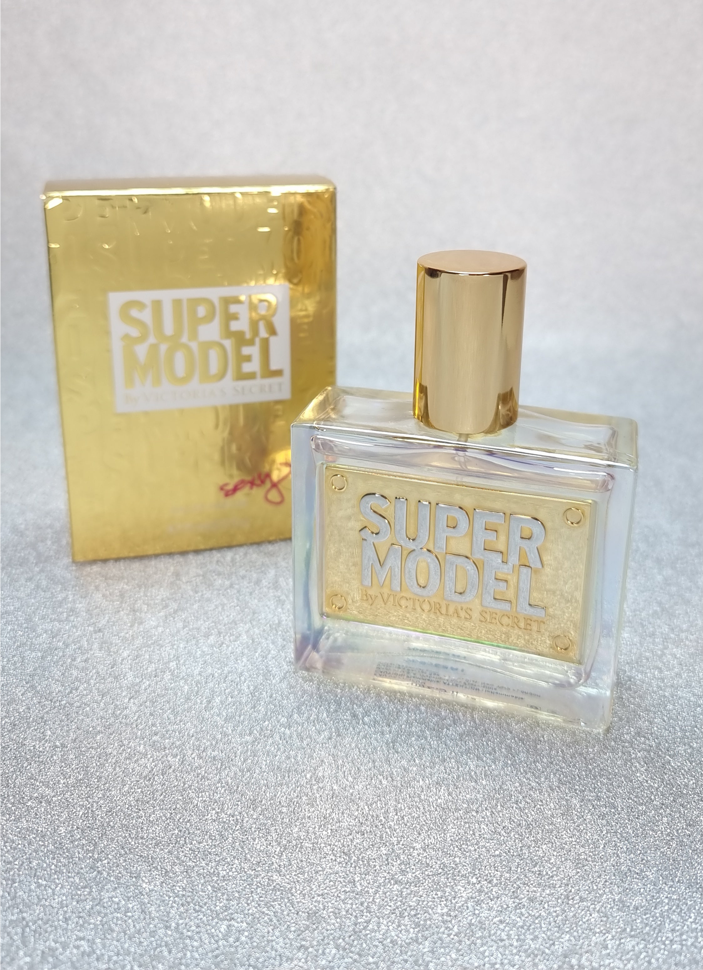Super Model EDP parfumová lahev s zlatými detaily a krabicí, Victoria’s Secret