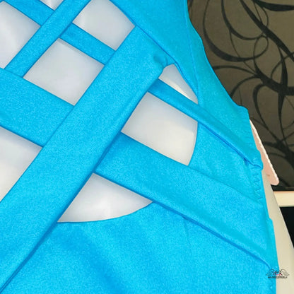 Bright blue fabric with geometric cutout patterns for Agent Provocateur Plavky Keia