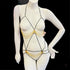 Manekýn s zlatými řetízky v agent provocateur playsuit, luxusní styl