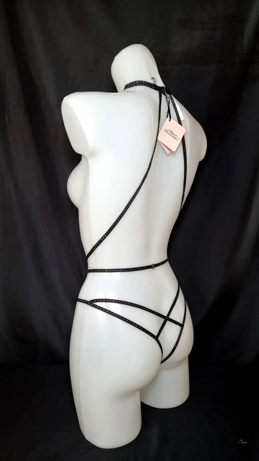 Black rhinestone body harness on white mannequin for Agent Provocateur Playsuit Rubi