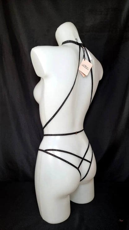 Black rhinestone body harness on white mannequin for Agent Provocateur Playsuit Rubi