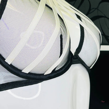 Agent Provocateur Podprsenka Carissa s černobílými pruhy a ozdobnými pásky