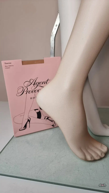 Pink hosiery packaging for Agent Provocateur Punčochy Taurus Hold Up Champagne Stocking 9 Denier