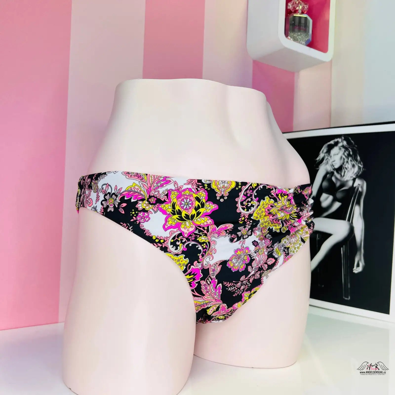 Floral print bikini bottom with black background and vibrant flowers from Barevný zázrak