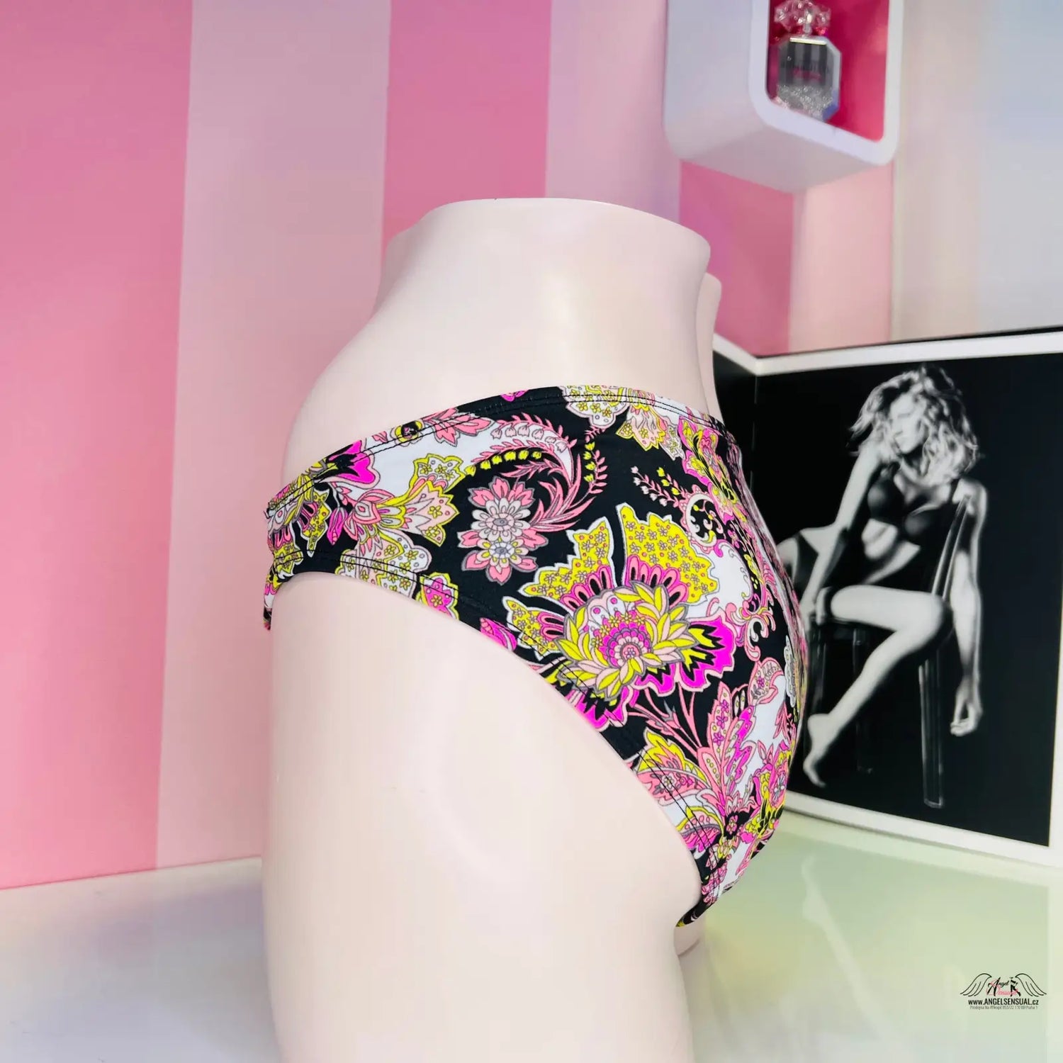 Floral patterned bikini bottom with paisley designs in pink, yellow, and white