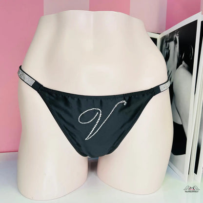 Černé bikini tanga s ozdobnými kamínky ve tvaru ’V’ na bocích a přední straně