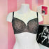 Lace black bra on white mannequin torso, Elegantní krajková podprsenka s nastavitelnými ramínky