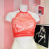 Mannequin in red lace top showcasing Elegantní Krajkový Bralet s Vysokým Krkem
