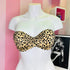 Strapless leopard print bandeau bikini top on white mannequin for summer elegance