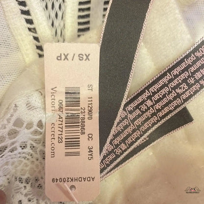 Label on a white dress from Luxusní Elegance: Krajková Braletka od Braletka