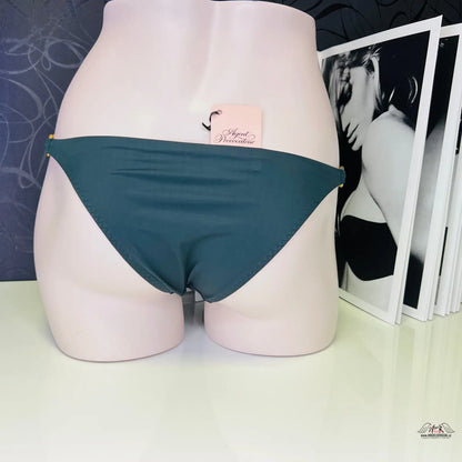 Teal bikini bottom on a pale mannequin torso for stylish summer wear