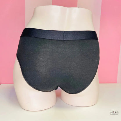 Ženský torso v černých kalhotkách pro pohodlné nošení značky Objevte Nejvyšší Pohodlí