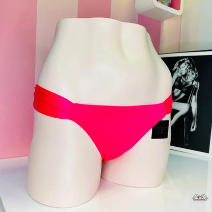 Hot pink bikini bottoms with shiny accents for a sophisticated look