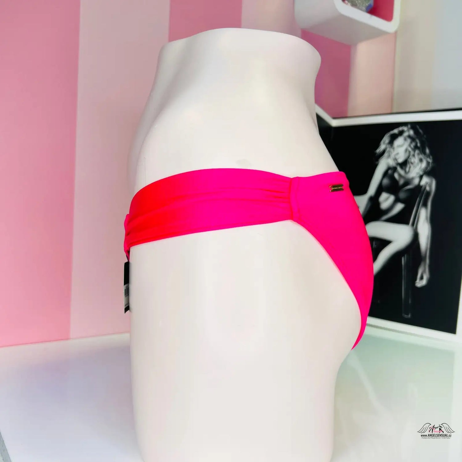 Hot pink bikini bottoms with glossy accents for a sophisticated look