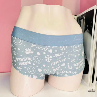 Světle modré boxerky s vánočním textem a vločkami pro moderního muže