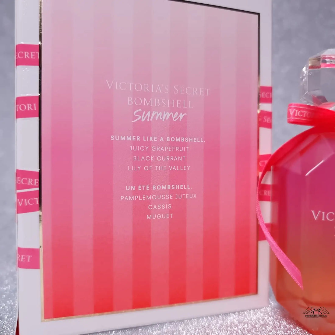 Pink and orange striped Victoria’s Secret Bombshell Summer fragrance box and bottle for apparel &amp; accessories