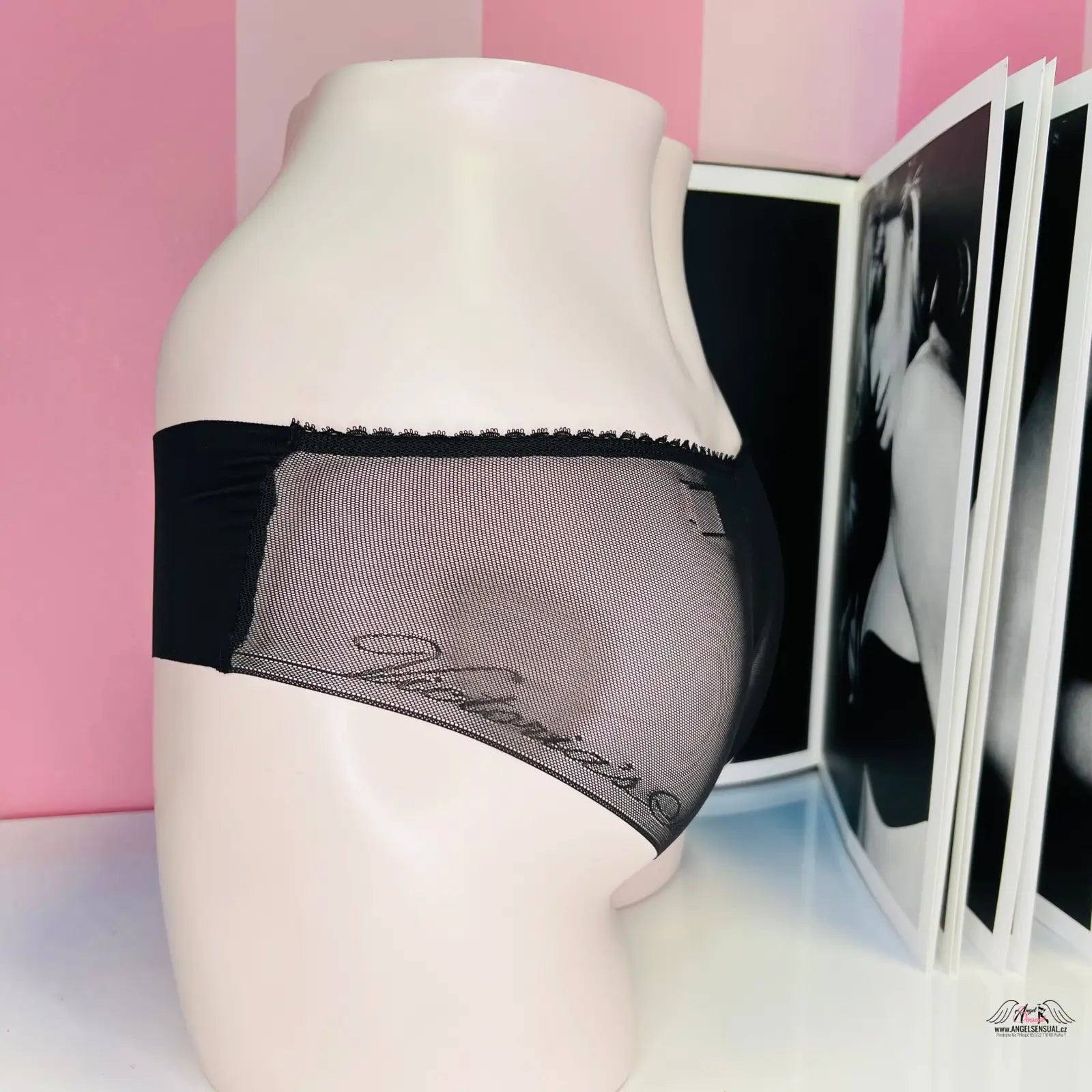 Black and gray mesh underwear on white mannequin for Victoria’s Secret apparel &amp; accessories