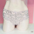 Bílé krajkové brazilky Victoria’s Secret s jemným květinovým vzorem v kategorii apparel & accessories