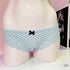 Mannequin torso s modro-černým mašlí na krajkové kalhotky bikini Victoria’s Secret whispers of luxury