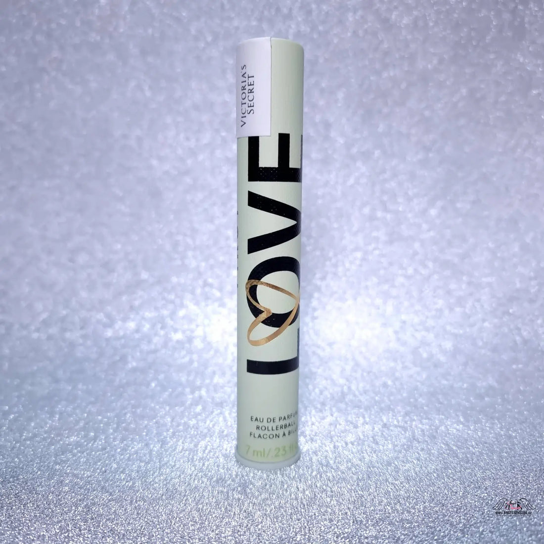 Victoria’s Secret Love Rollerball perfume in light green tube with black and gold lettering