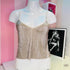 Pleated gold camisole nařasený lesklý top na mannequin, Victoria’s Secret Noční Košilka