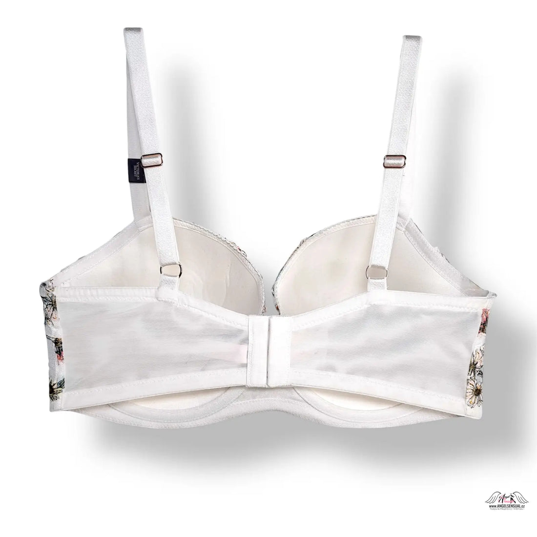 Elegantní bílá podprsenka s květinovým vzorem a stříbrným hardwarem