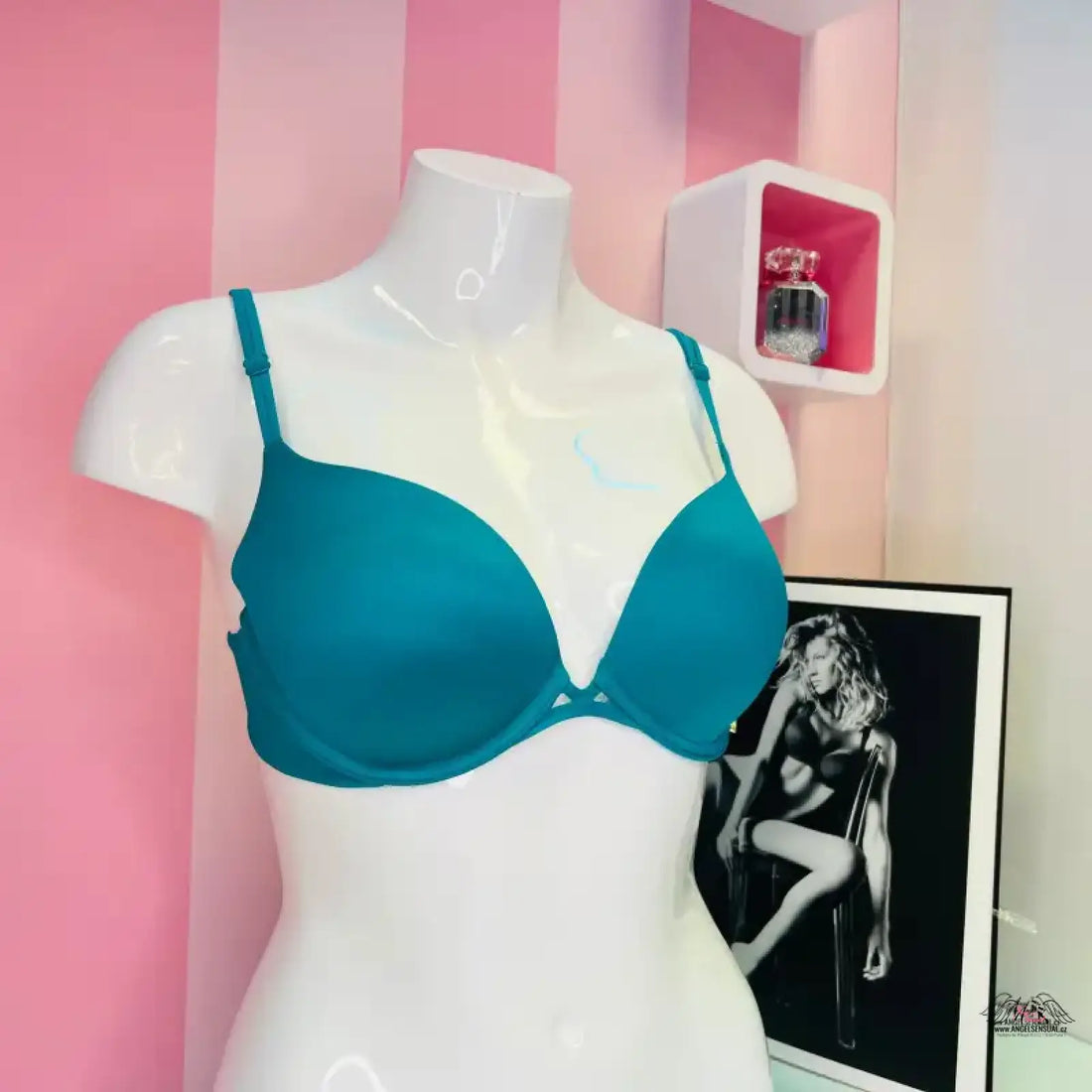 Teal push-up podprsenka Victoria’s Secret s nastavitelnými ramínky na bílé figuríně