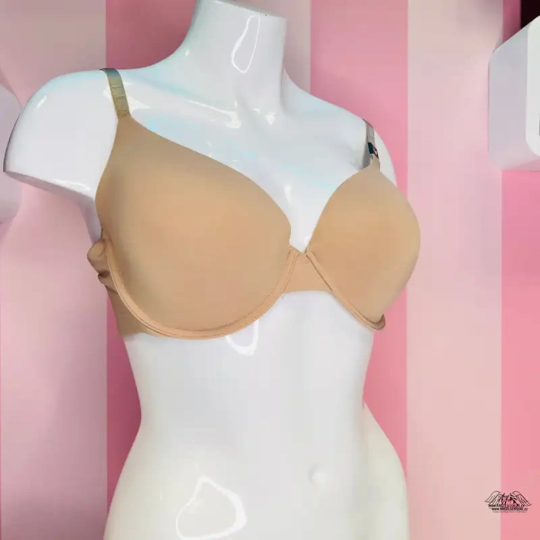 Nude-colored padded bra displayed on a white mannequin for victoria’s secret apparel & accessories