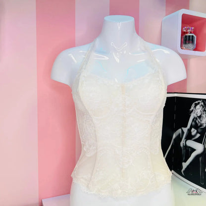 Manekýn s bílým svůdný růžový korzetem v produktu Victoria’s Secret Síťovaný Korzet Více Barev