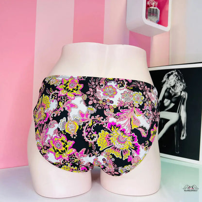 Floral patterned underwear with black background and pink, yellow, purple flowers, barevný spodní díl plavek