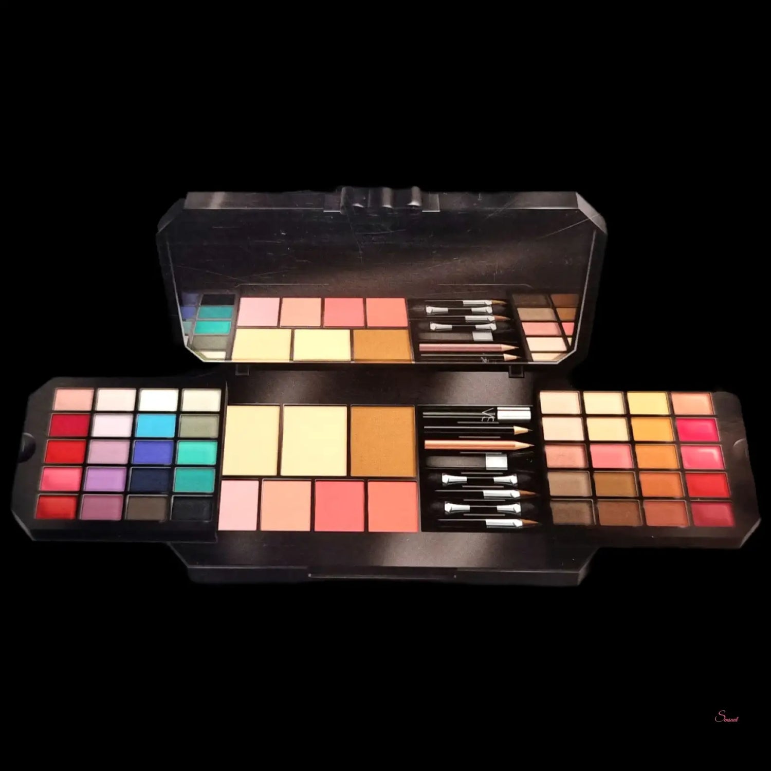 Open Victoria’s Secret Ultimate Bombshell Makeup Kit with eyeshadows, blush, and brushes