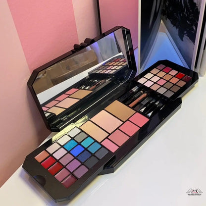 Open makeup palette with mirror from Victoria’s Secret Ultimate Bombshell Makeup Kit